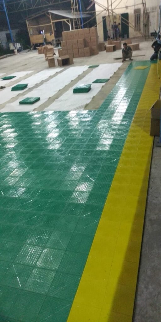 perbaikan interlock lapangan voli